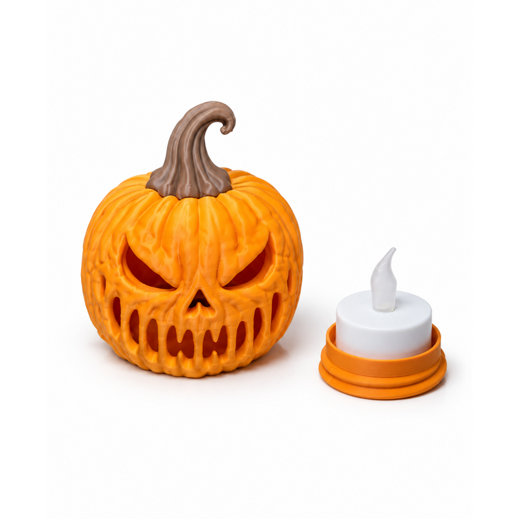 Bad Pumpkin LED tealight holder with LED tealight seated in the removable base