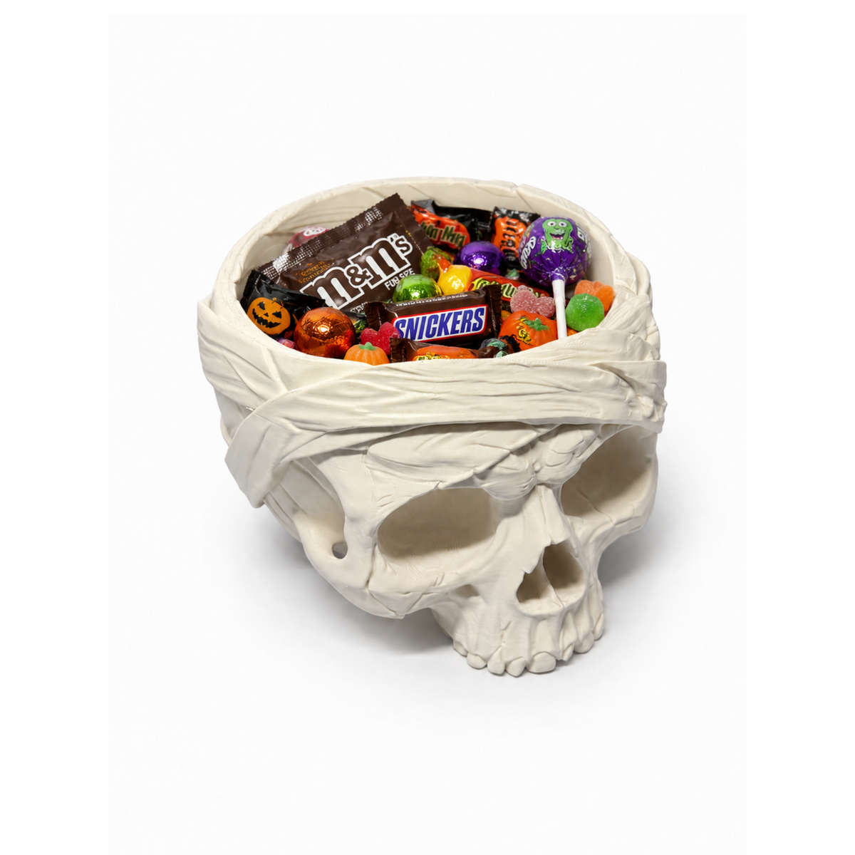 Mummy Skull Bowl shown filled with wrapped sweets